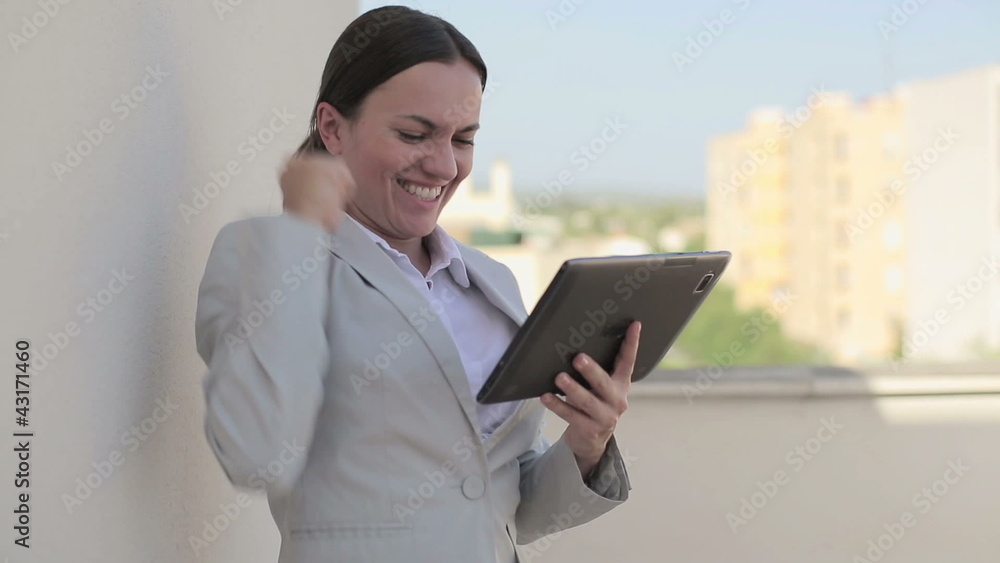 Successful businesswoman with tablet computer, outdoors Successful businesswoman with tablet computer, outdoors