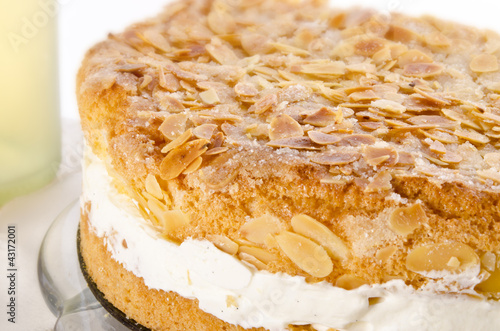 flat cake with an almond and sugar coating  photo