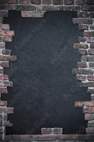 brick stone wall with dark text space photo