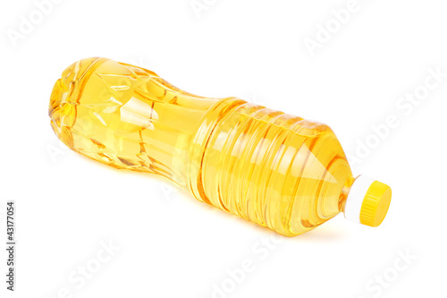Oil in a bottle isolated on a white background