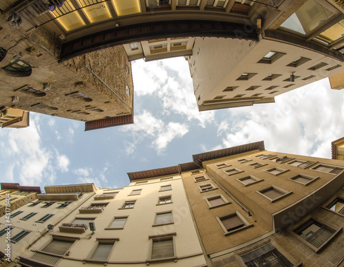 Upward fisheye view of Ancient Buildings and Homes in Florence,