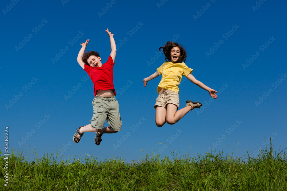 Girl and boy running, jumping outdoor Girl and boy running, jumping outdoor