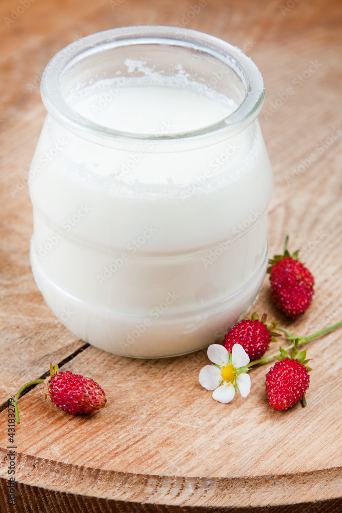 Natural yoghurt in a glass pot Natural yoghurt in a glass pot