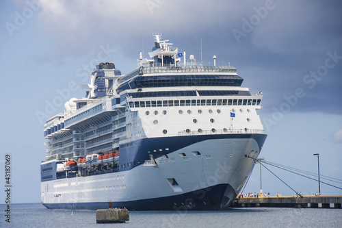Blue and White Cruise Ship Under Clouds © dbvirago