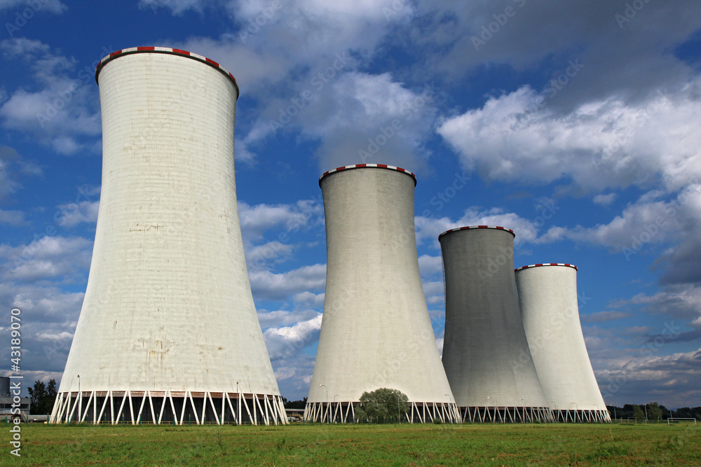 four coal power plant cooling tower under dramatic sky four coal power plant cooling tower under dramatic sky
