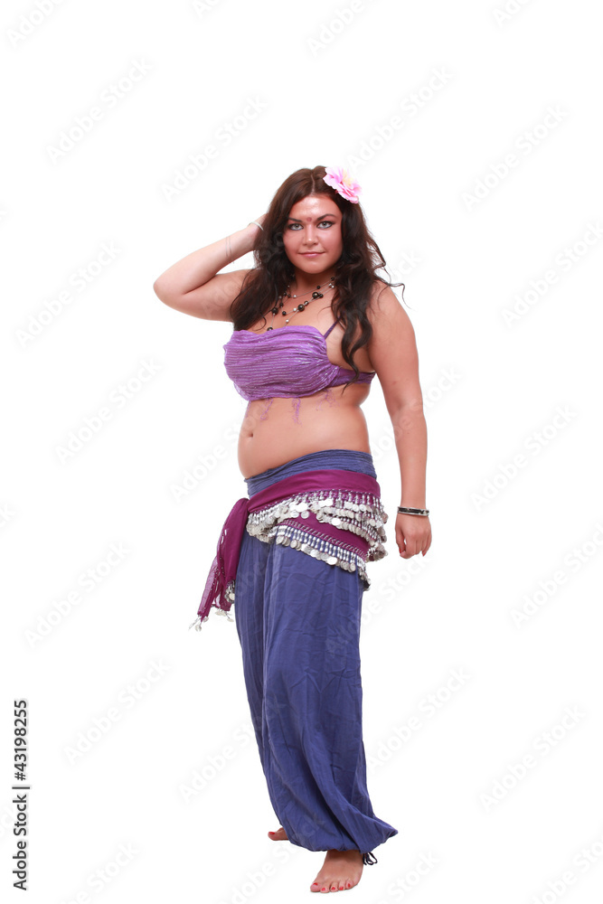 Studio shot of cute belly dancer on white