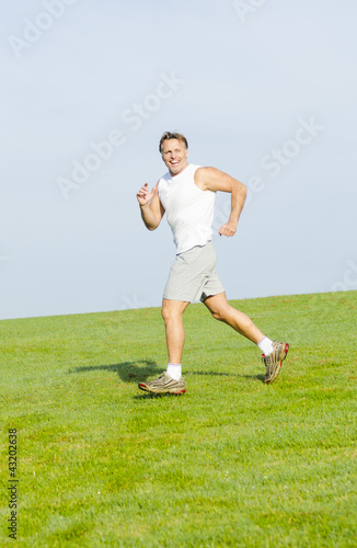 happy smiling man running.