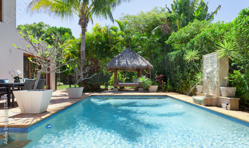 Backyard with swimming pool © Image Supply Co