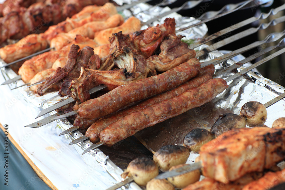 Grilled sausage on barbecue