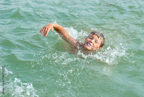Wallpaper Mural little boy swimming Torontodigital.ca