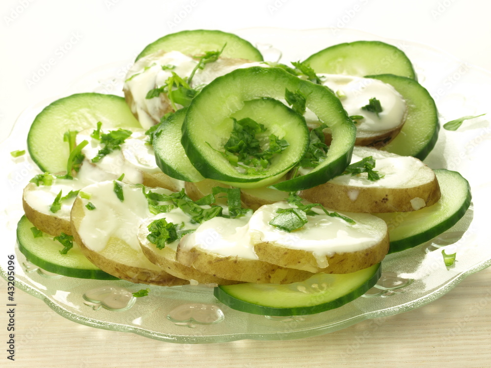 Slices of potato and cucumber Slices of potato and cucumber