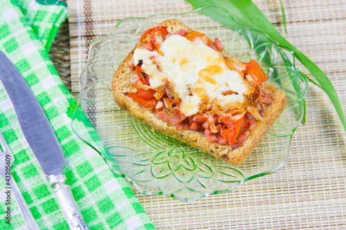 hot open sandwich with sausage and vegetables