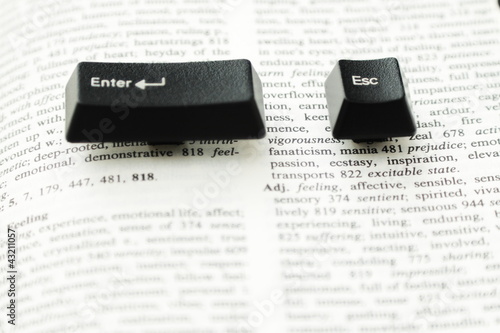 Foto Enter and Escape Keys on a Book Page