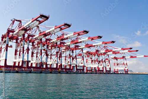 Fotografering Cargo Cranes in Industrial Port