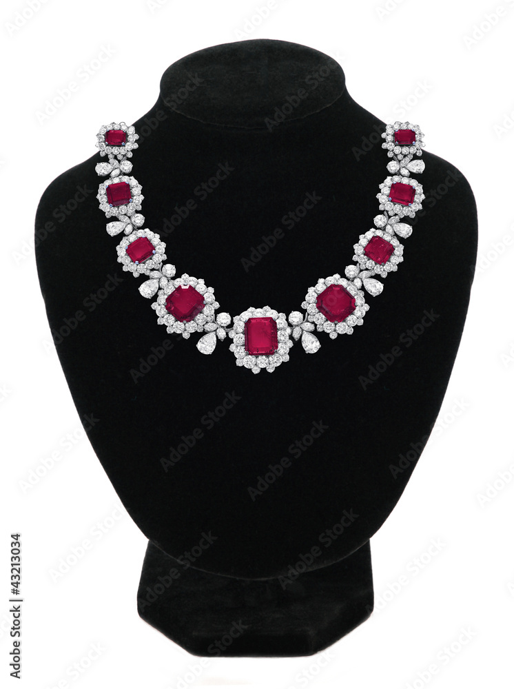 Pendant with red gem stones on black mannequin isolated on white Pendant with red gem stones on black mannequin isolated on white