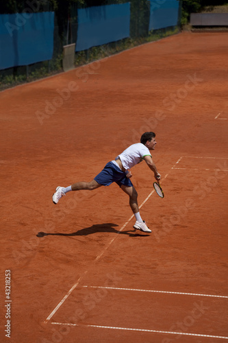 tennis player at the service