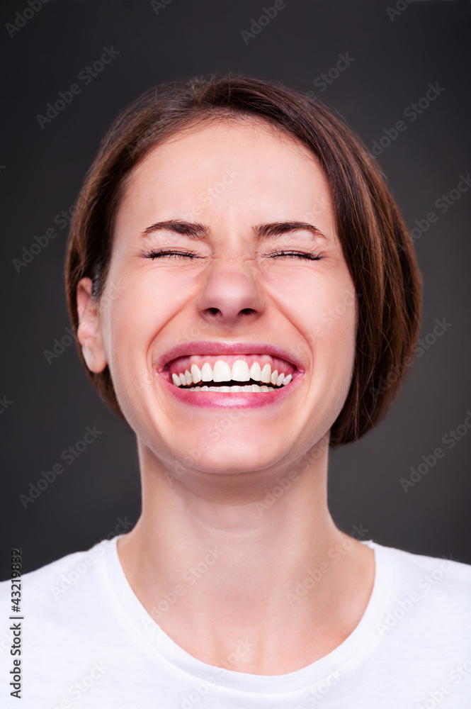 woman is laughing loudly woman is laughing loudly