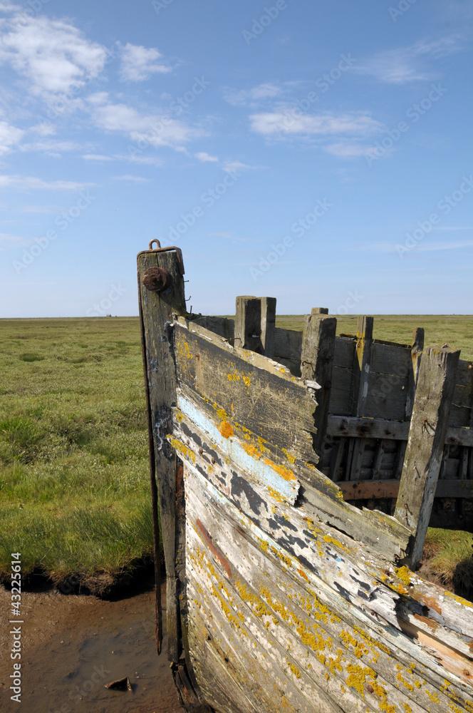 Remains of fishing boat on Norfolk coast at Blakeney Remains of fishing boat on Norfolk coast at Blakeney