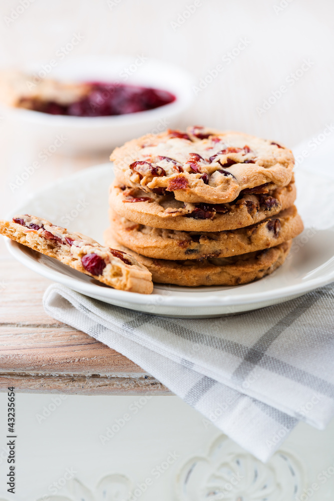 Cranberry and orange cookies on a kitchen table Cranberry and orange cookies on a kitchen table