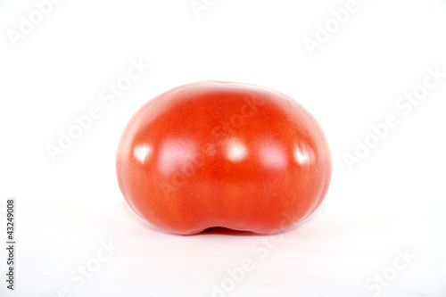 A tomato bottom side view with white background