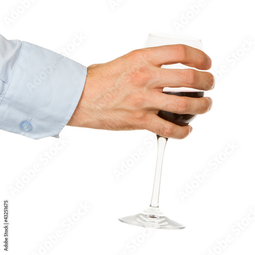 Businessman holding a glass of red wine