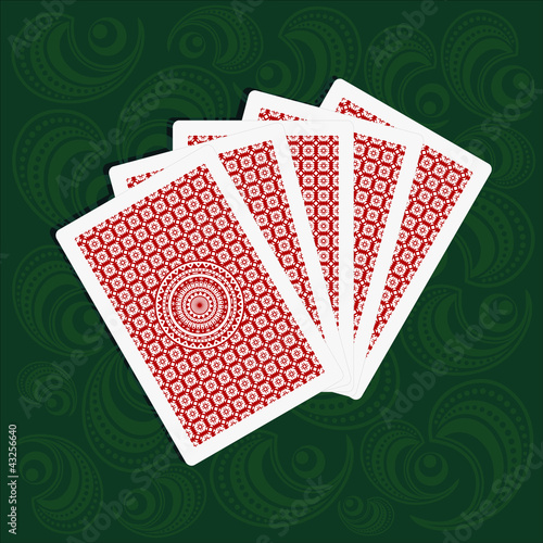 playing cards back sides on green background