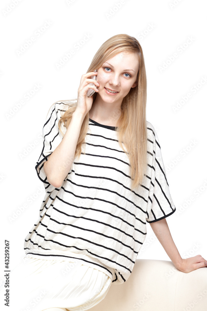 Beautiful young woman using a mobile phone Beautiful young woman using a mobile phone