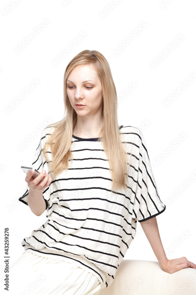 Beautiful young woman using a mobile phone Beautiful young woman using a mobile phone