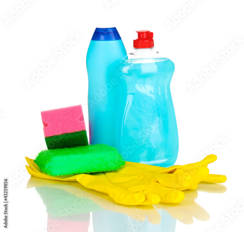 Dishwashing liquids with gloves and sponge isolated on white