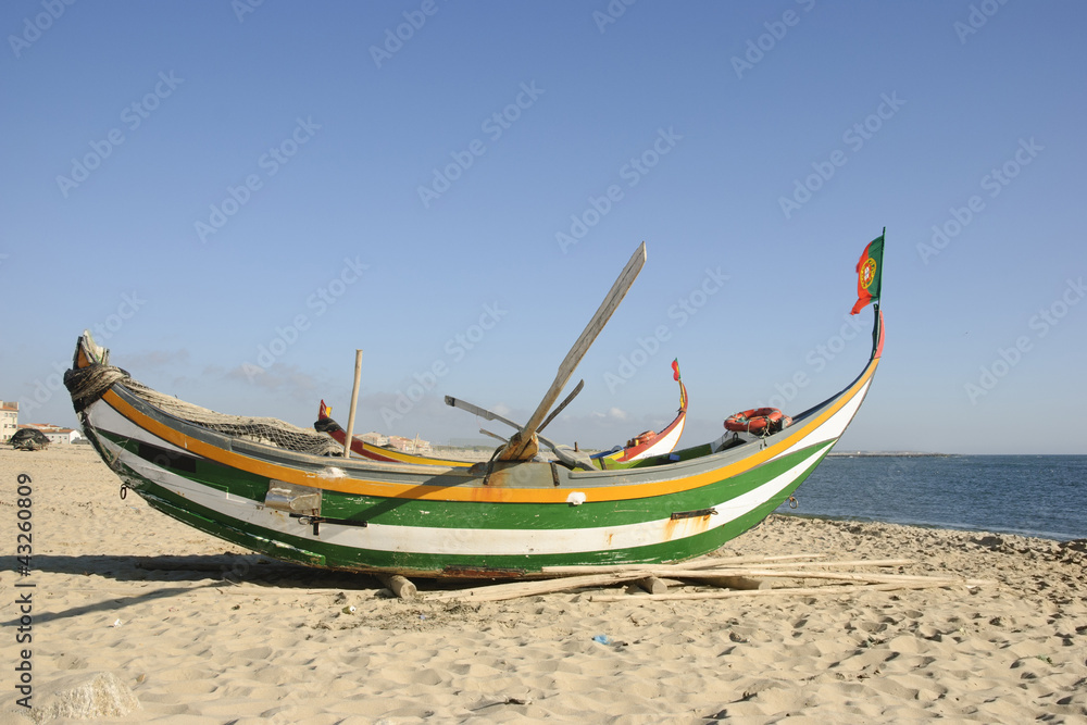 Typical portuguese fishing boat on the beach, Espinho, Portugal Typical portuguese fishing boat on the beach, Espinho, Portugal