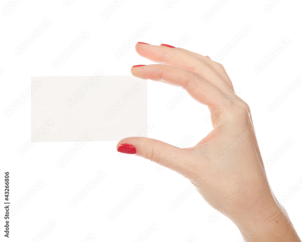Obraz premium Female hand holding a blank paper. isolated in white