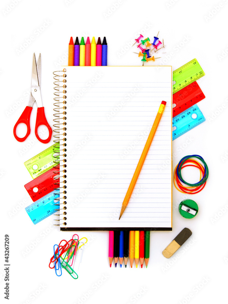 Notebook with pencil and colorful school supplies Notebook with pencil and colorful school supplies