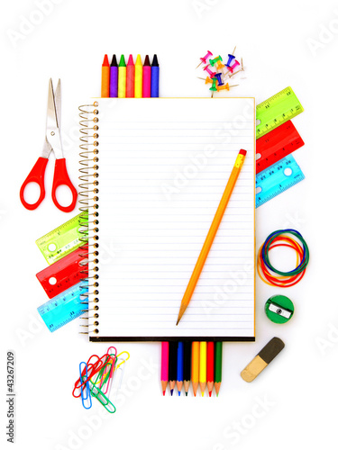 Notebook with pencil and colorful school supplies