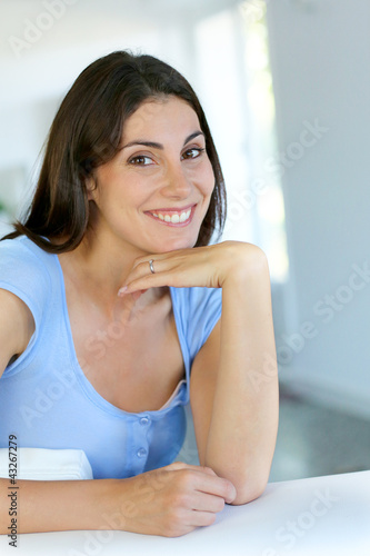 Closeup of smiling girl with satisfied look on her face