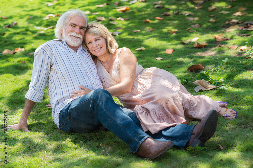 Fototapeta premium Senior people in love with man and woman hugging