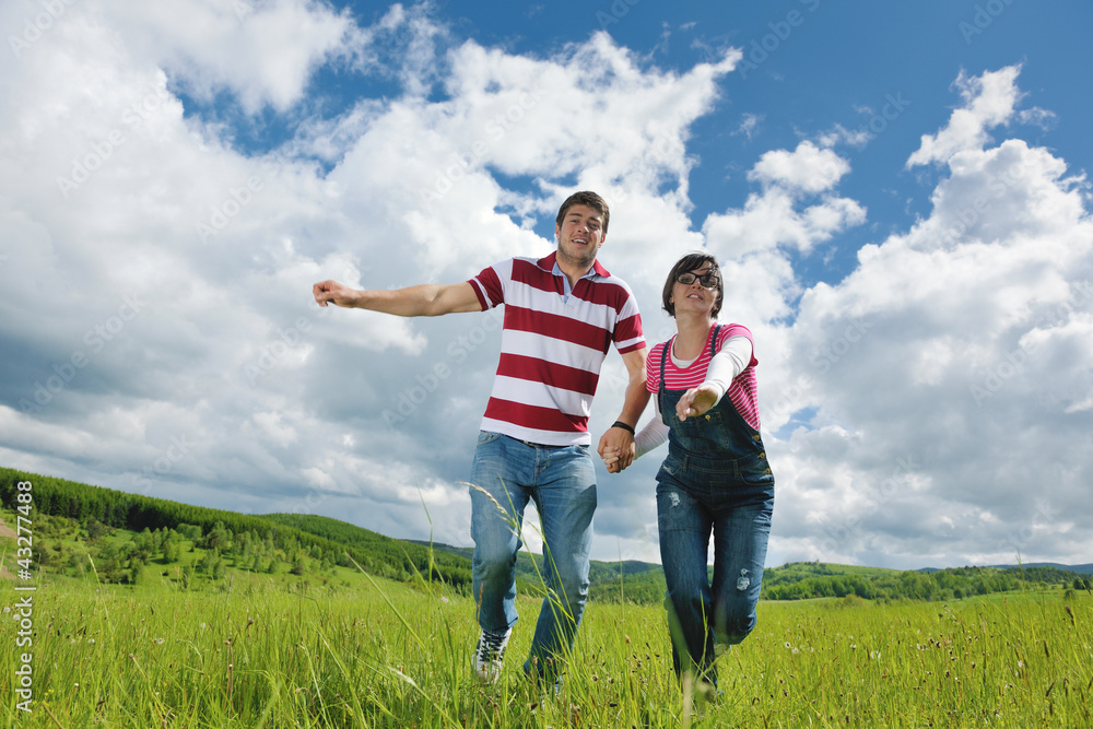 Portrait of romantic young couple smiling together outdoor Portrait of romantic young couple smiling together outdoor