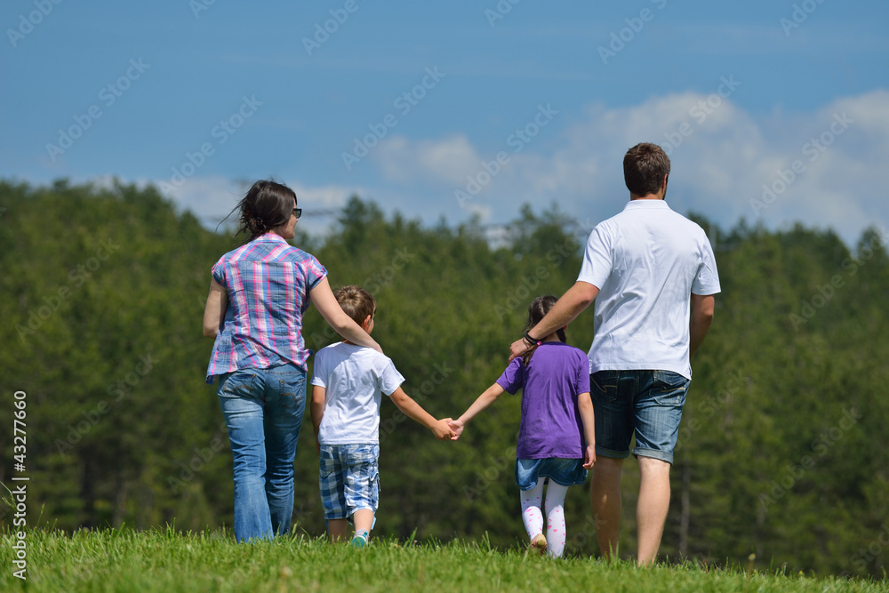 happy young family have fun outdoors happy young family have fun outdoors