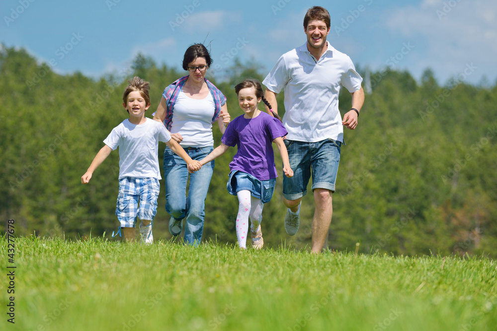 happy young family have fun outdoors happy young family have fun outdoors