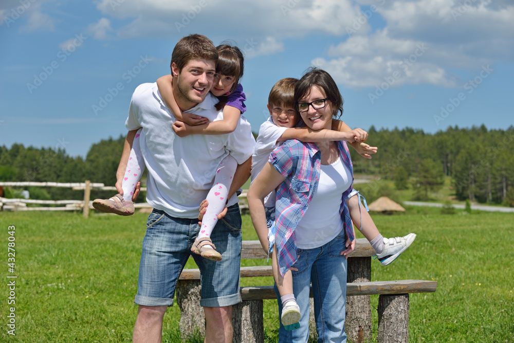happy young family have fun outdoors happy young family have fun outdoors