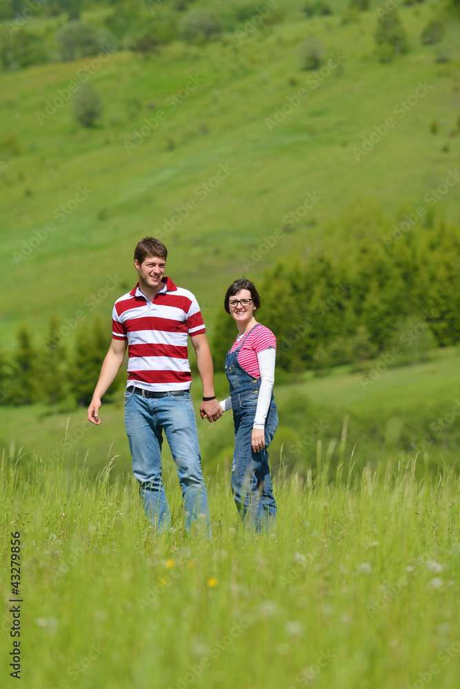 Portrait of romantic young couple smiling together outdoor Portrait of romantic young couple smiling together outdoor
