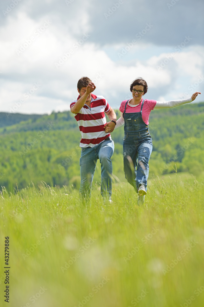 Portrait of romantic young couple smiling together outdoor Portrait of romantic young couple smiling together outdoor