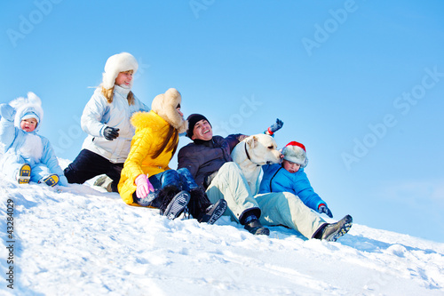 Laughing family in winter park