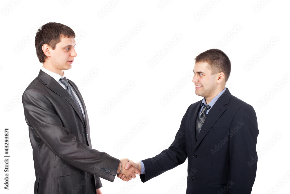 Young business men shaking hands isolated on white background Young business men shaking hands isolated on white background