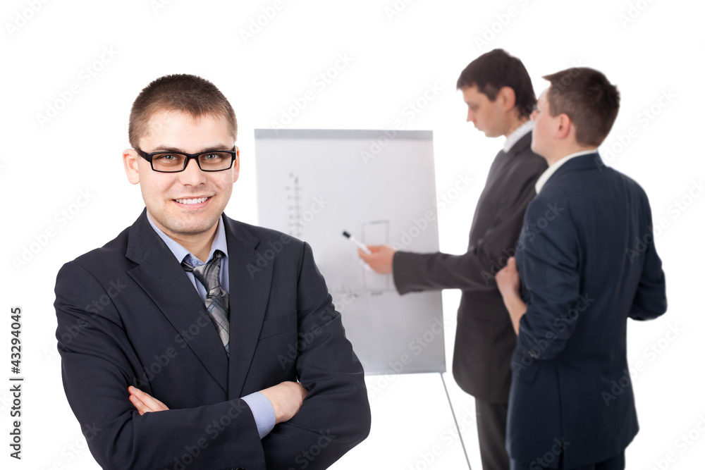 Group of businesspeople and a flipchart isolated on white Group of businesspeople and a flipchart isolated on white