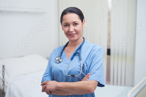 Nurse standing with crossed arms