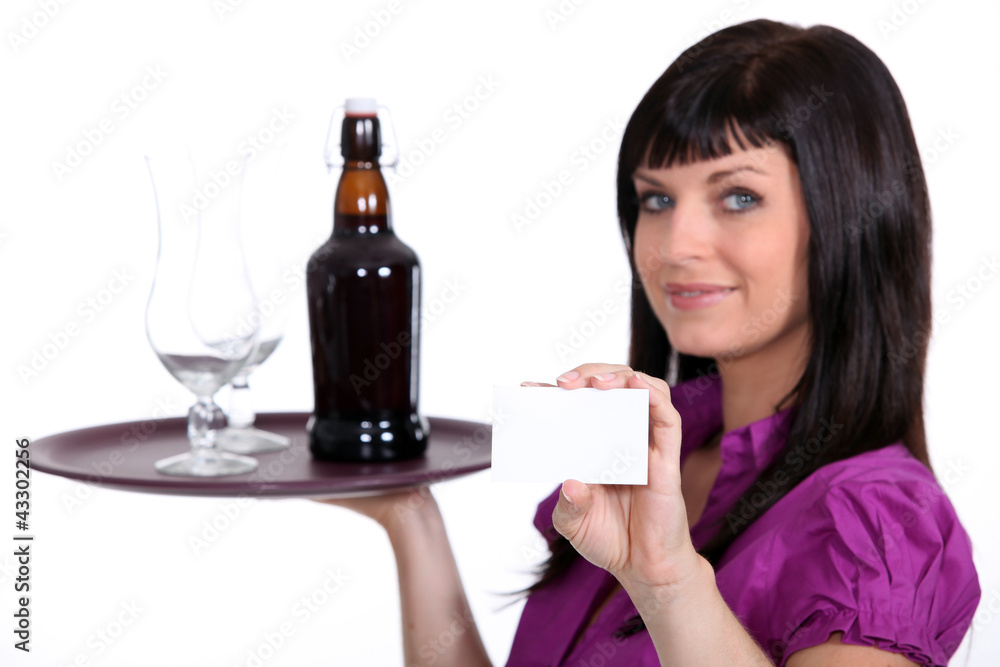 Female waitress, holding tray of beer and business card Female waitress, holding tray of beer and business card