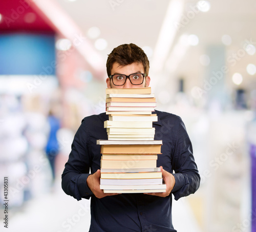 Young Man With Books photo