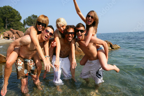 young people having fun at beach