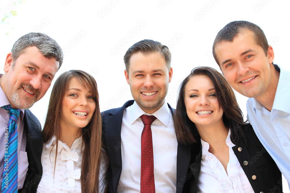 Group of business people laughing and smiling Group of business people laughing and smiling
