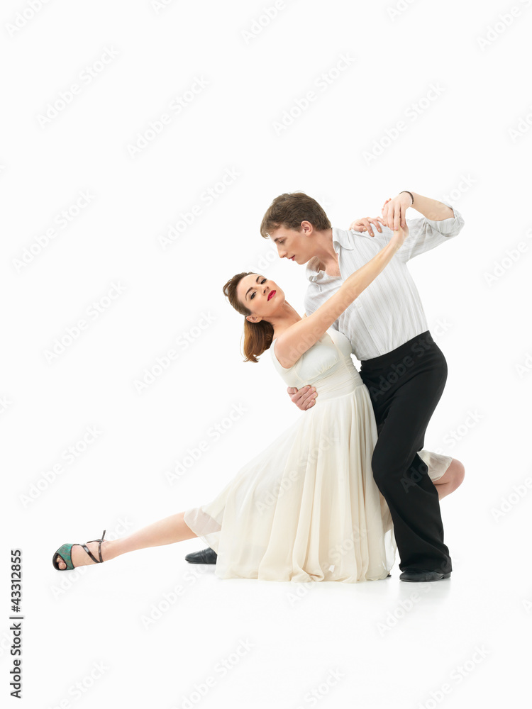 passionate dancing couple on white background